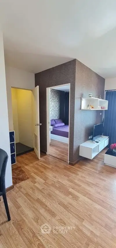 Modern apartment interior with wooden flooring and stylish decor