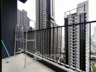 Modern urban balcony with cityscape view in high-rise apartment