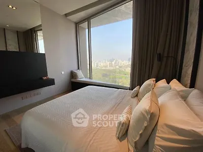 Luxurious bedroom with panoramic city view and elegant decor