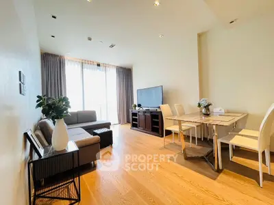 Spacious modern living room with elegant dining area and natural light