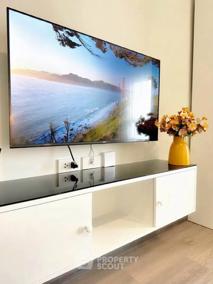 Modern living room with sleek TV setup and stylish decor