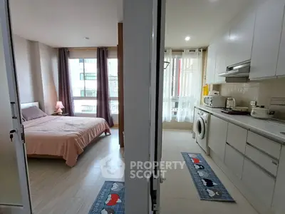 Modern apartment with cozy bedroom and fully equipped kitchen