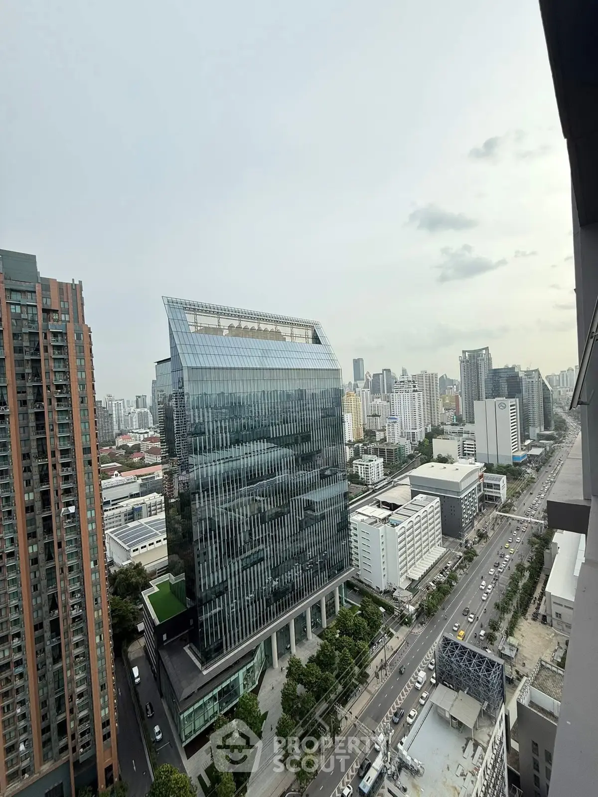 Stunning cityscape view showcasing modern high-rise buildings and bustling urban life.