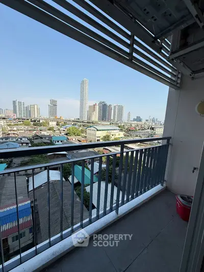 Stunning cityscape view from a high-rise balcony, perfect for urban living enthusiasts.