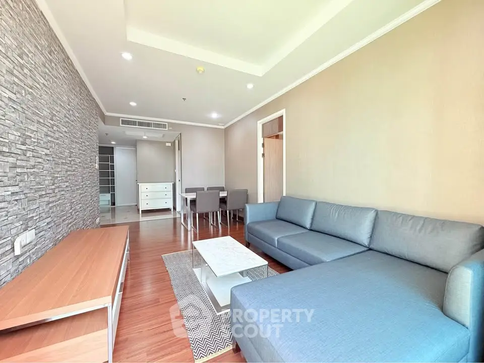 Spacious modern living room with stylish decor and cozy seating area
