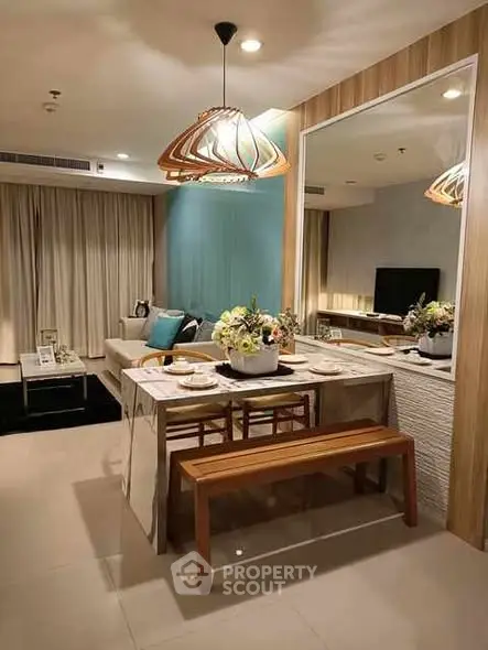 Modern open-plan living room with stylish dining area and elegant decor