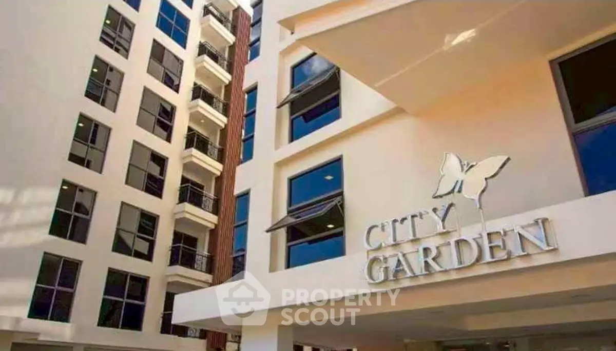 Modern city apartment building with elegant design and large windows