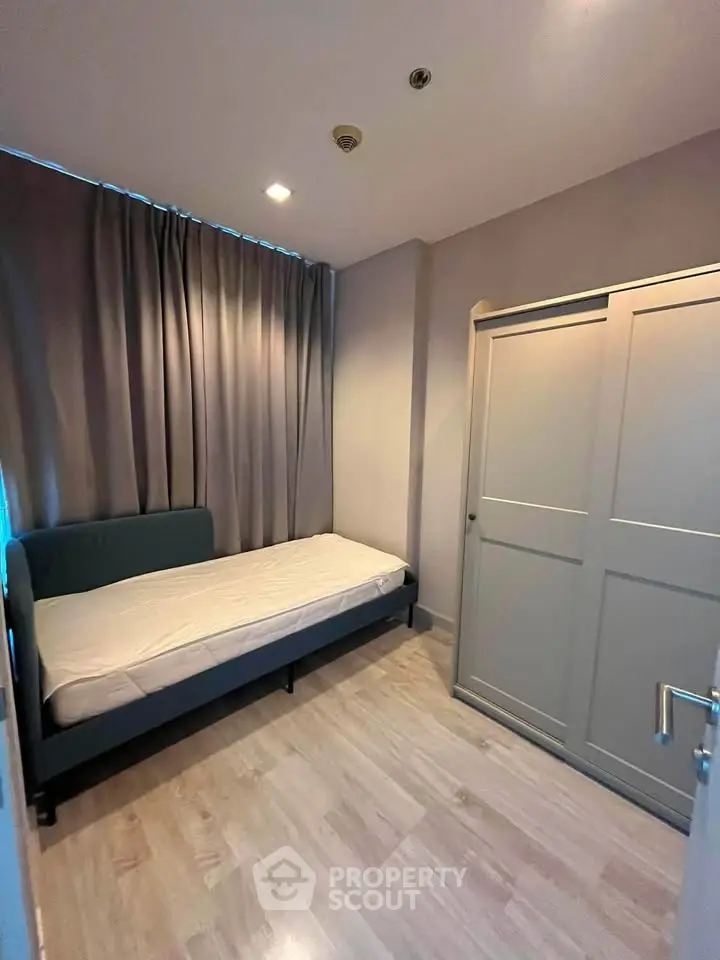 Cozy bedroom with modern design and ample storage space