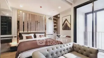 Luxurious modern bedroom with elegant decor and private balcony access