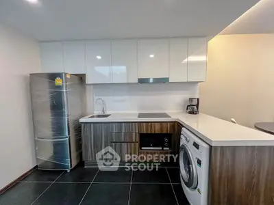 Modern kitchen with sleek appliances and stylish cabinetry