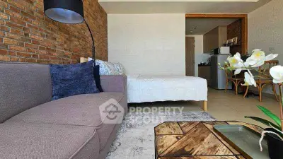 Chic studio apartment with modern decor and cozy living area