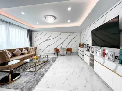 Luxurious modern living room with marble accents and elegant decor