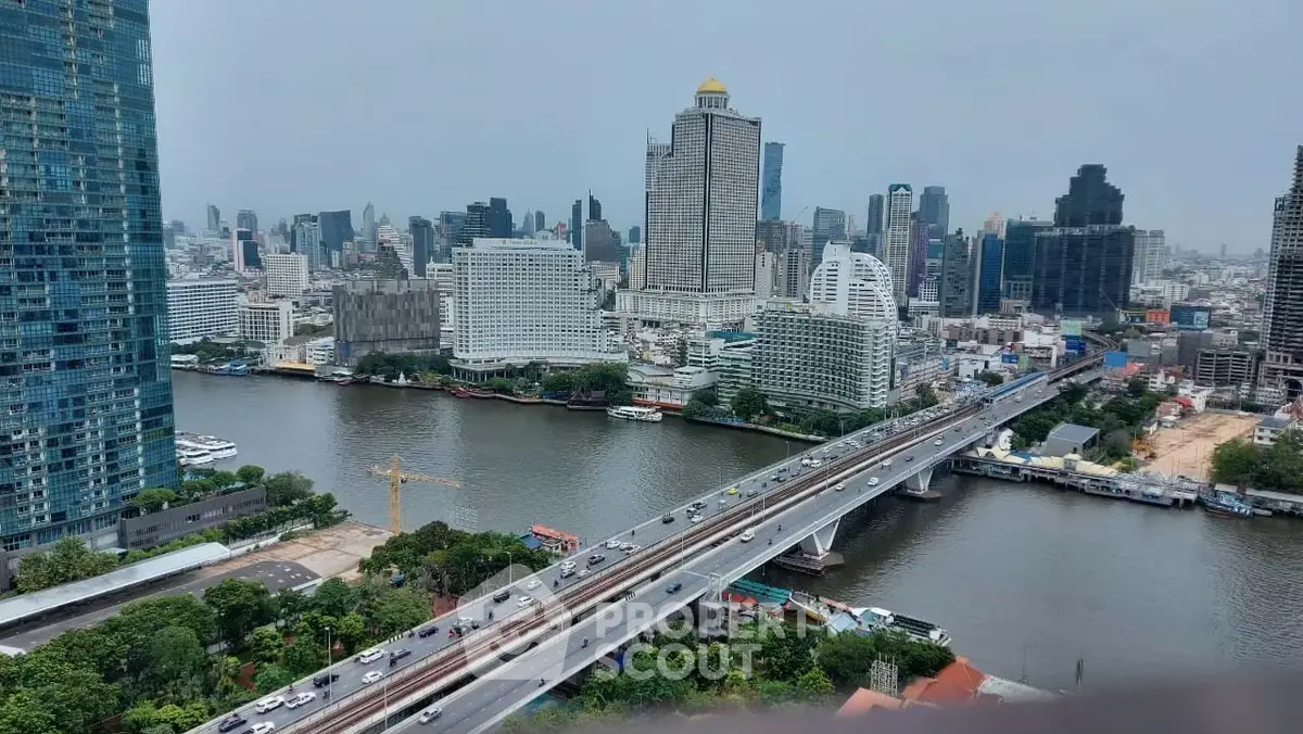 Stunning cityscape view with river and skyscrapers, perfect for urban living enthusiasts.