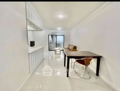 Spacious minimalist living room with modern furniture and sleek design