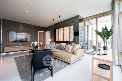 Luxurious modern living room with elegant decor and large windows offering stunning views.