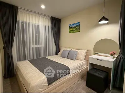 Cozy bedroom with modern decor and natural light, perfect for relaxation.