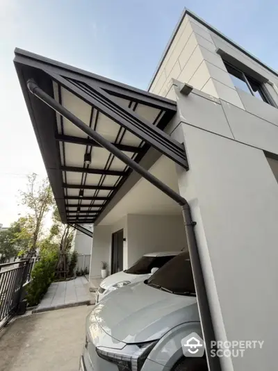 Modern home exterior with sleek carport and stylish architecture