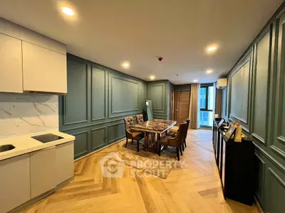 Elegant dining area with modern kitchen in luxury apartment