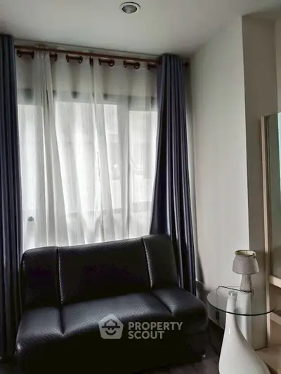 Cozy living room with modern sofa and stylish curtains