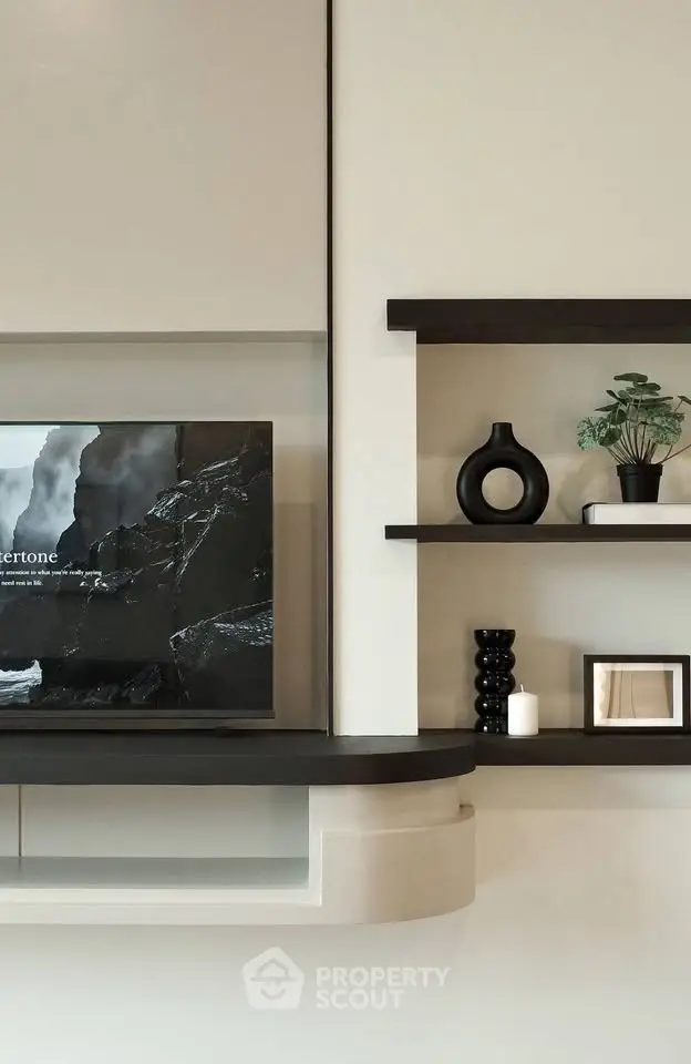 Modern living room with stylish shelving and decor accents