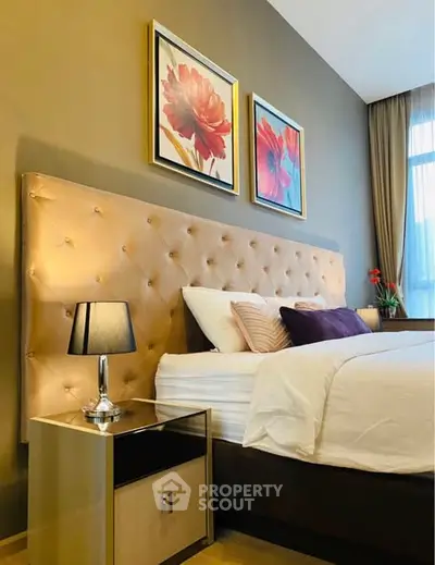 Luxurious bedroom with elegant decor and plush bedding