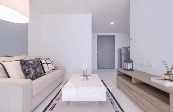 Modern minimalist living room with neutral tones and stylish decor