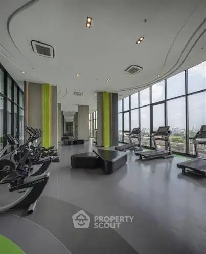 Modern gym with panoramic city views and state-of-the-art equipment