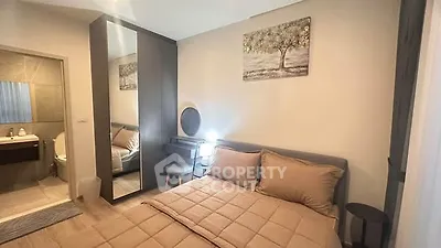 Cozy bedroom with ensuite bathroom and modern decor