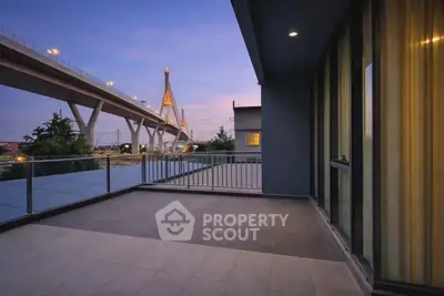 Spacious balcony with stunning city view and modern architecture