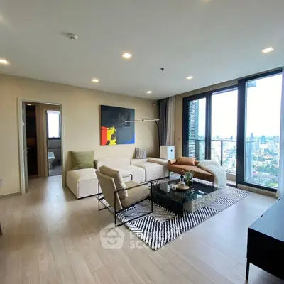 Spacious modern living room with city view and elegant decor