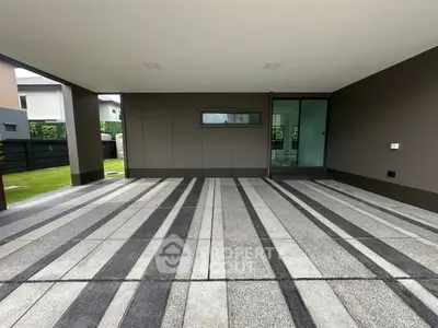 Modern covered parking area with sleek design and spacious layout