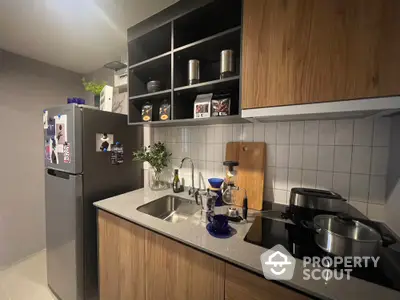 Modern kitchen with sleek cabinetry and stainless steel appliances