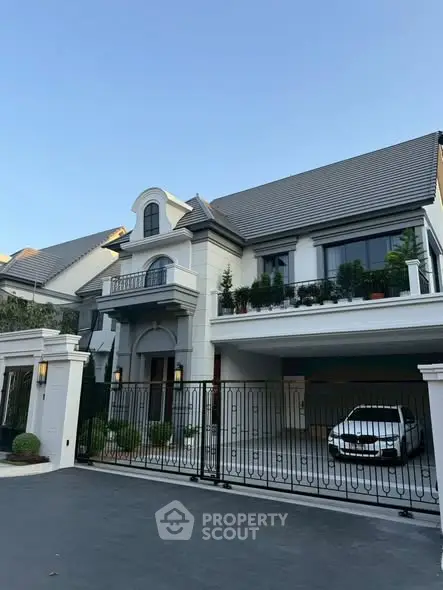 Elegant luxury home with gated entrance and spacious driveway