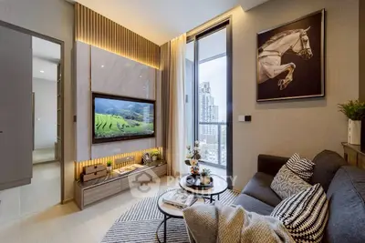 Modern living room with city view, stylish decor, and cozy seating area.