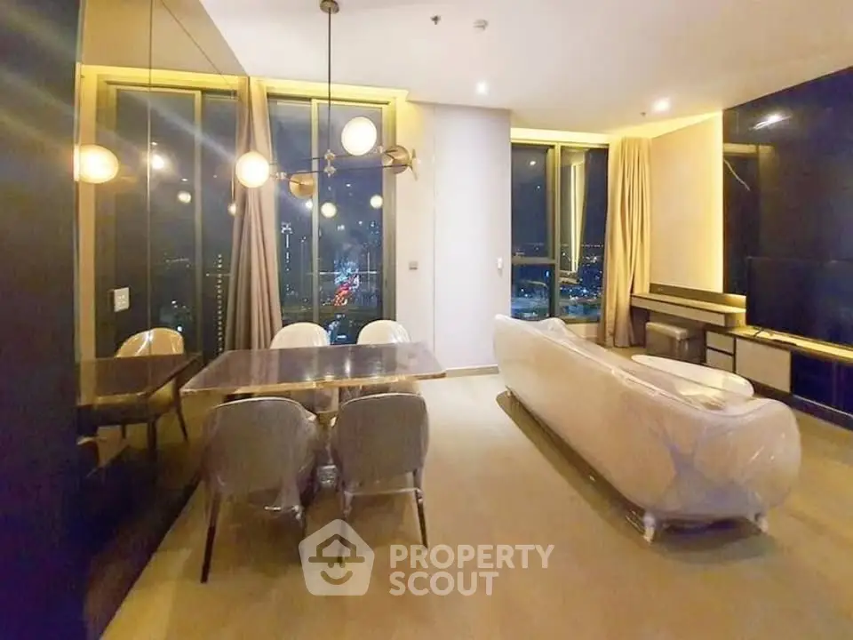 Luxurious modern living room with stunning city view and elegant furnishings