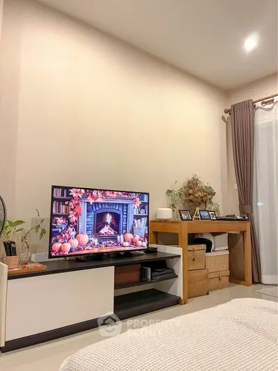 Cozy living room with modern TV setup and elegant decor