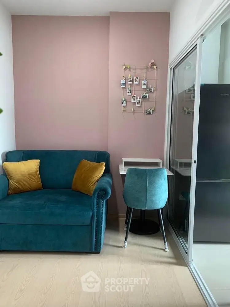 Chic modern living room with teal sofa and stylish decor