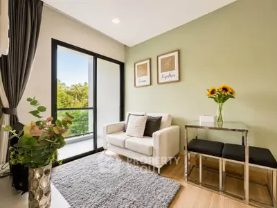 Charming living room with cozy seating and lush balcony view