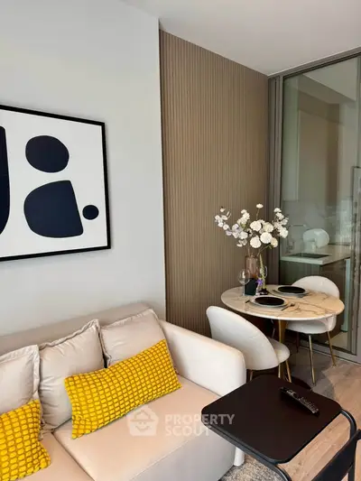 Modern living room with stylish decor and cozy dining area