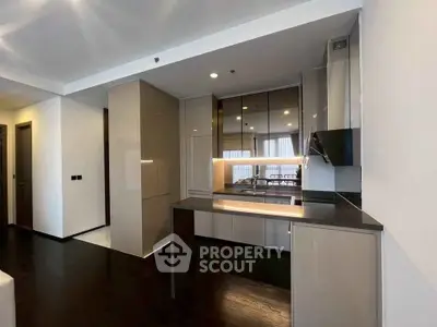 Modern kitchen with sleek cabinetry and open layout design