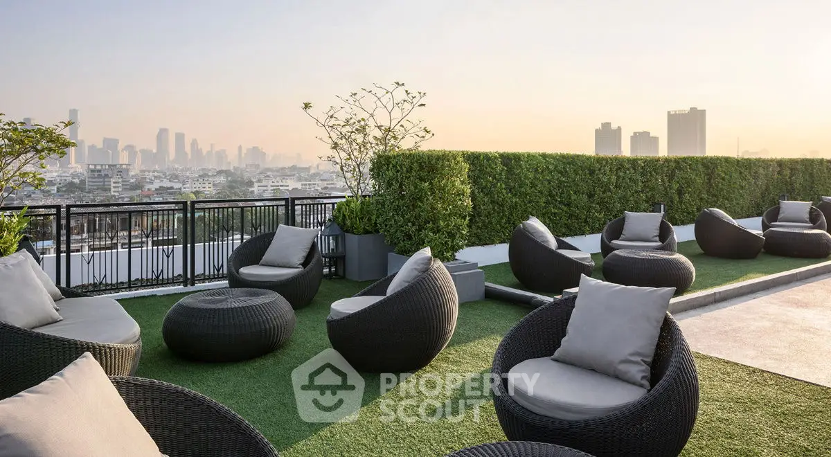 Stunning rooftop terrace with modern seating and city skyline view