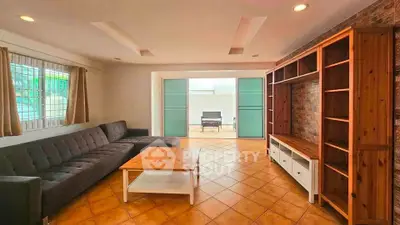 Spacious living room with modern furniture and natural light