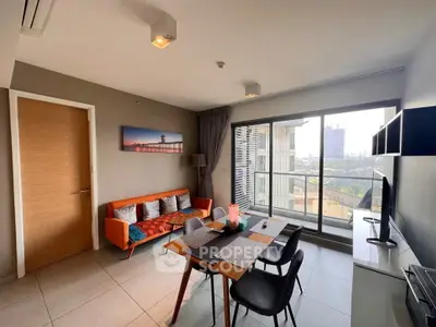 Modern living room with balcony view and stylish decor