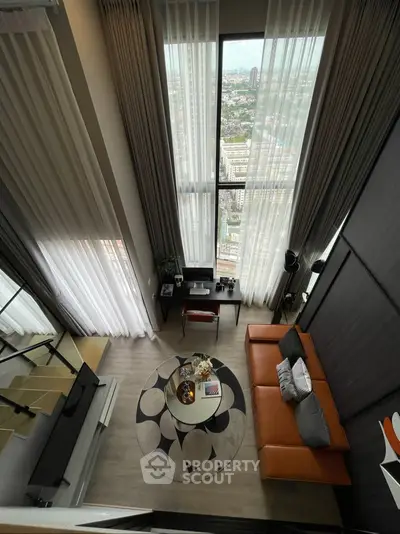 Luxurious high-rise living room with stunning city view and modern decor