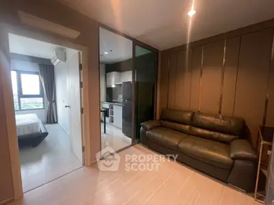 Modern apartment with cozy living room and sleek kitchen design