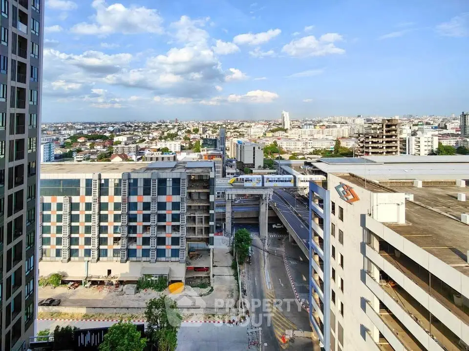 Stunning cityscape view from high-rise building showcasing urban development and vibrant skyline.
