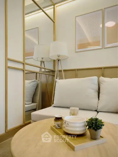 Cozy living room with modern decor and stylish wooden accents.