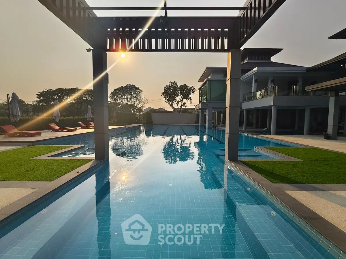 Luxurious poolside view with modern architecture and serene ambiance