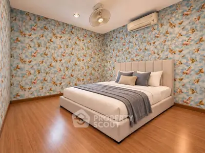 Elegant bedroom with stylish wallpaper and modern furnishings, featuring a cozy bed and air conditioning.