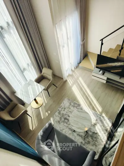Luxurious modern living room with high ceilings and elegant decor